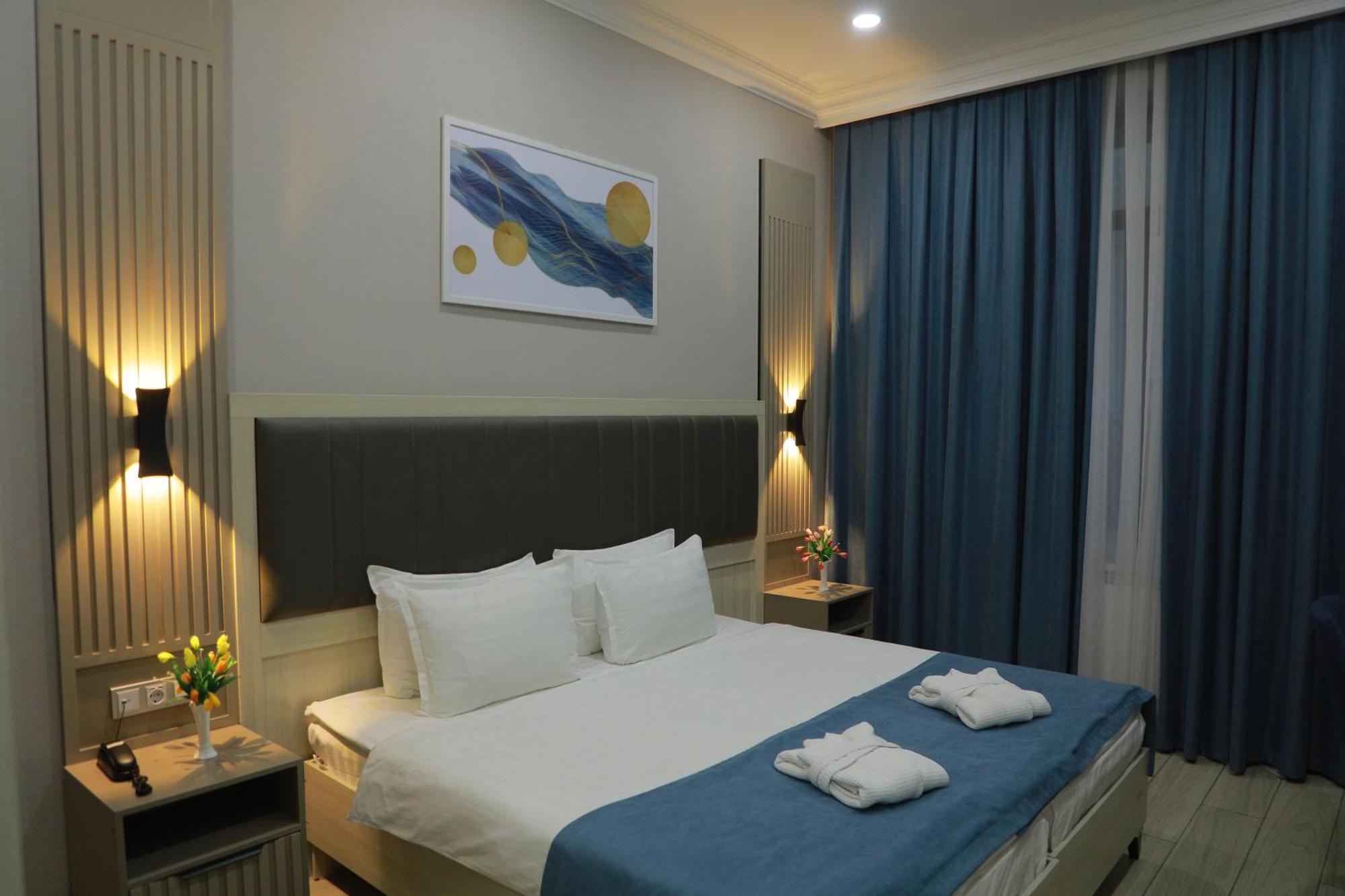 Human Hotel Tashkent Esterno foto